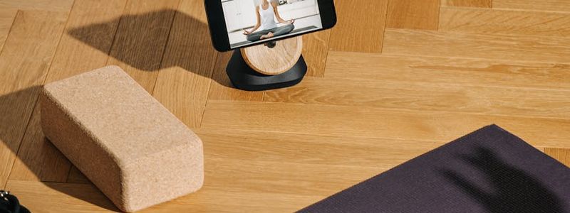 Minimalist fitness studio with mats on the floor.